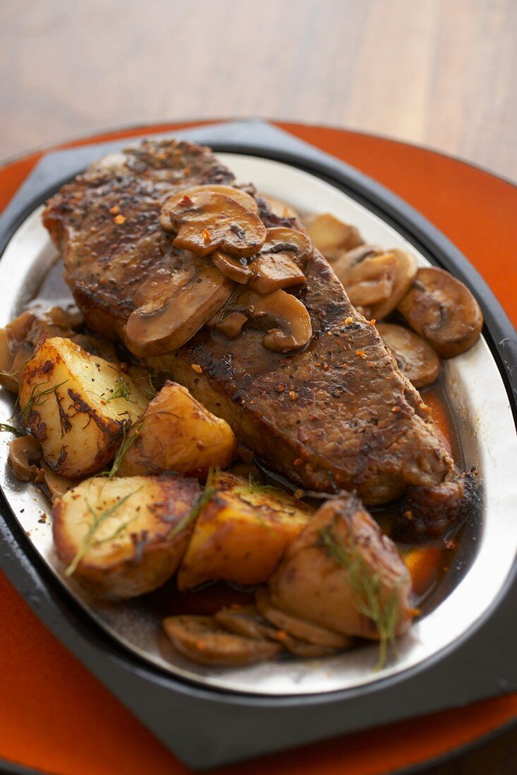 Sirloin Steak with Mushrooms and Potatoes in Au Jus Sauce