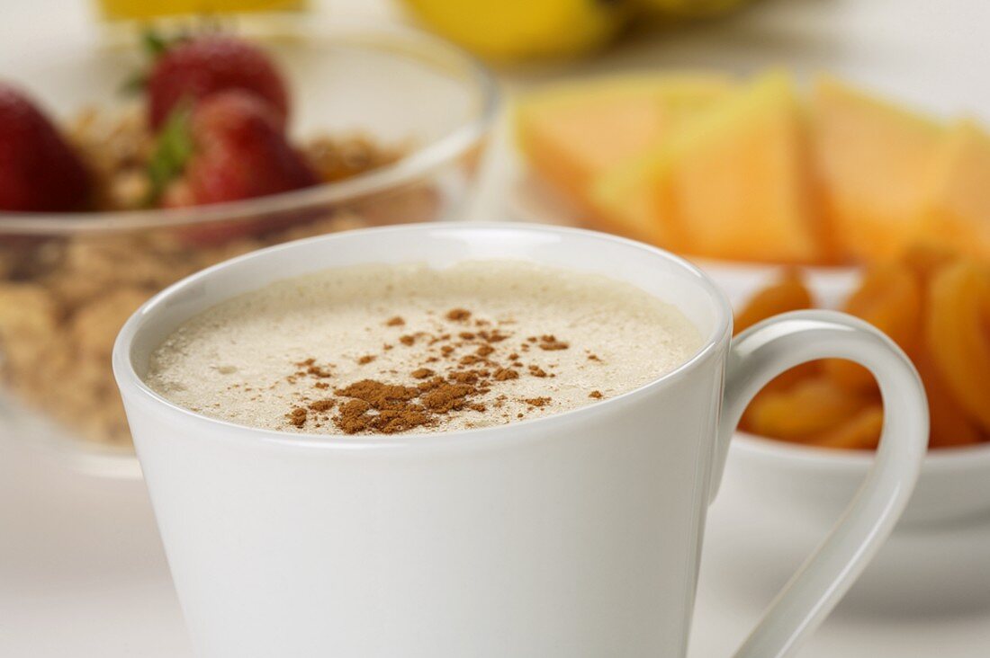 Mug of Coffee Latte on Breakfast Table
