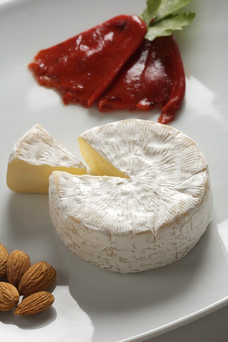 Wheel of Camembert with Wedge Removed, Almonds and Roasted Red Pepper