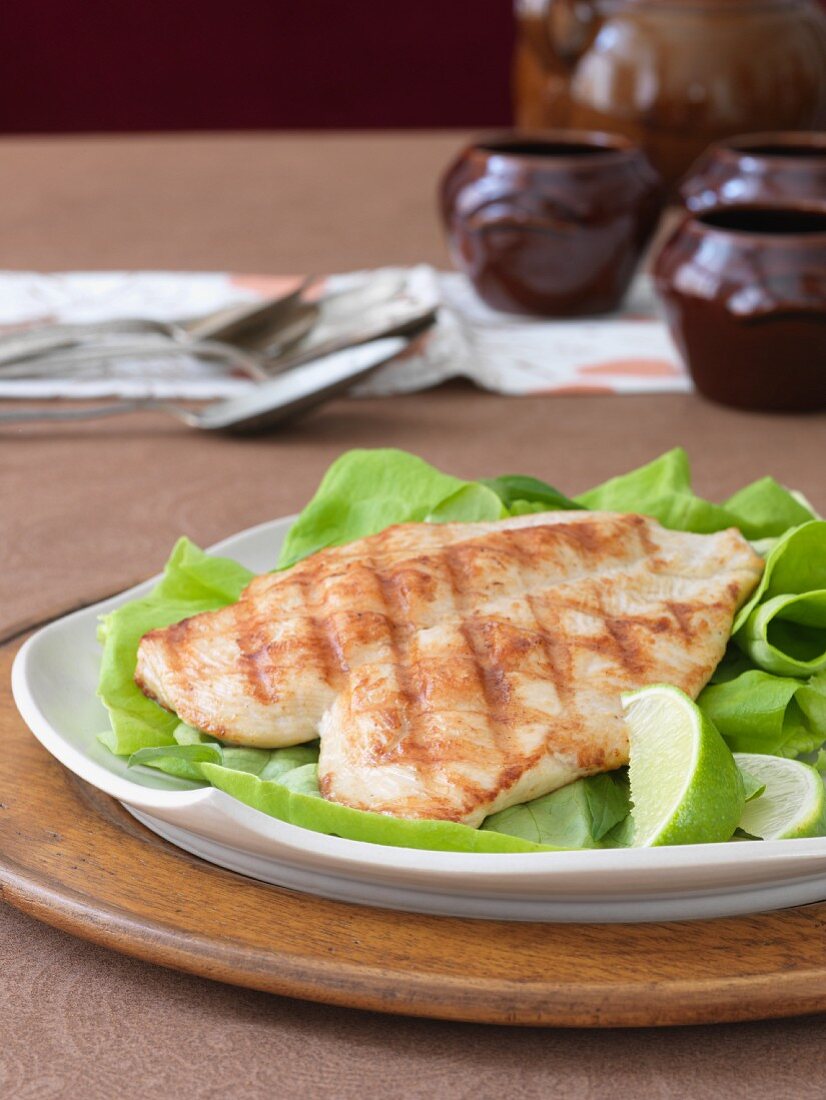 Grilled Chicken Breast with Lime on a Bed of Greens