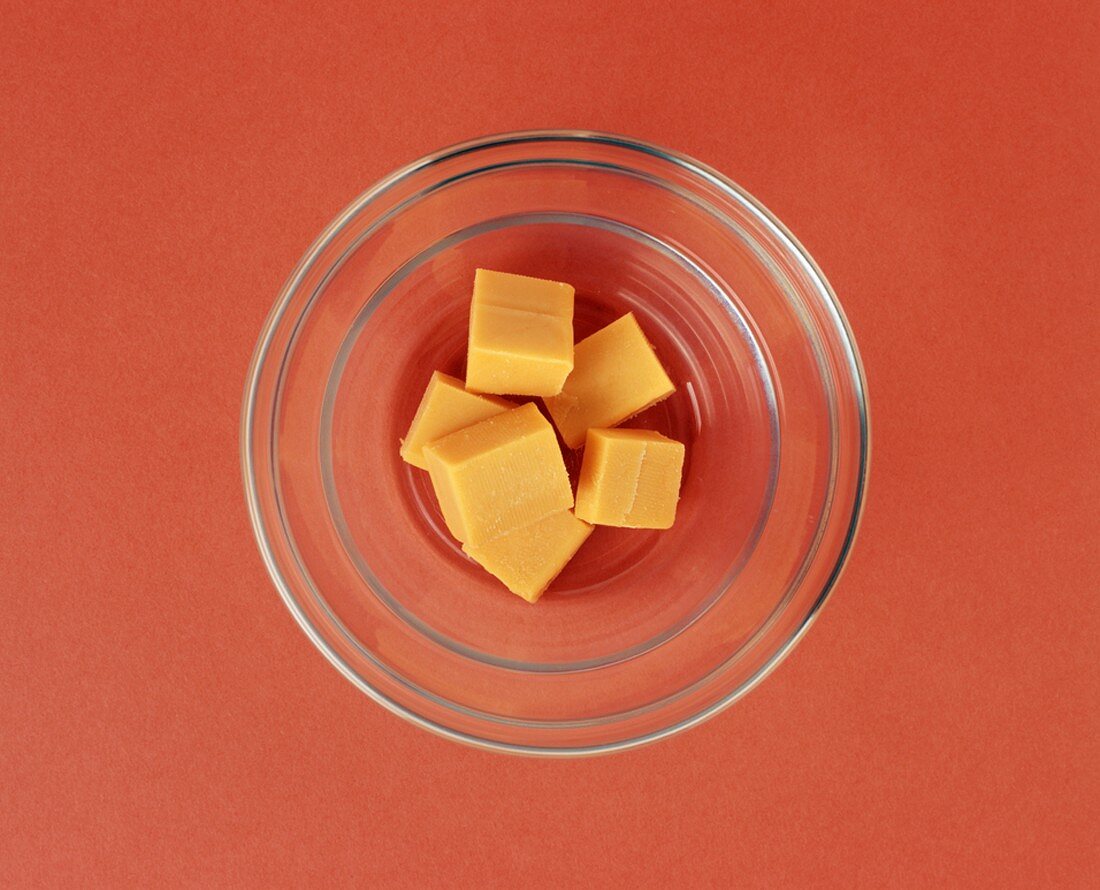 Orange Cheddar Cheese Cubes in a Bowl, From Above