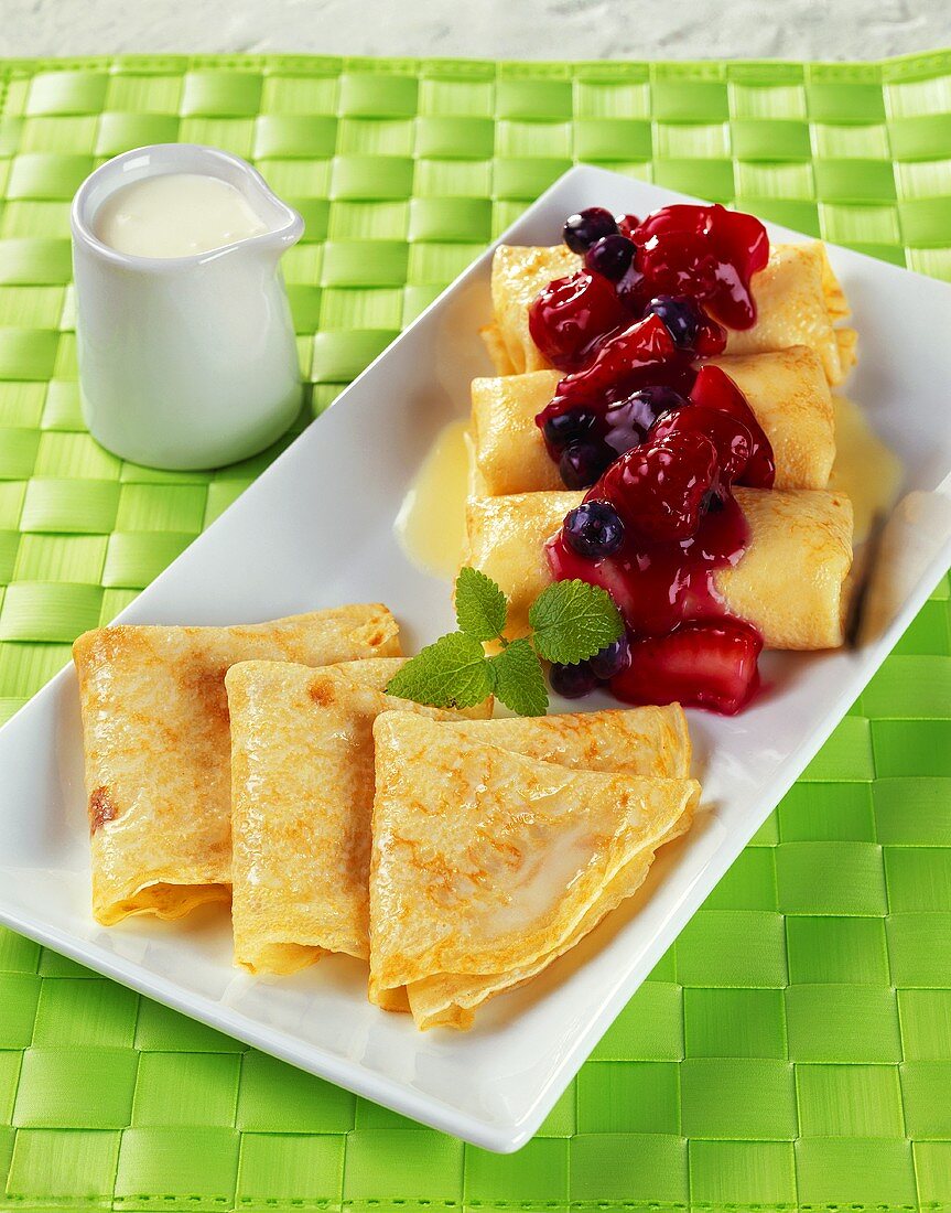 Crepes with Berry Sauce and a Pitcher of Cream
