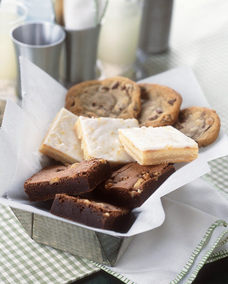 A Tin with Brownies, Lemon Squares and Chocolate Chip Cookies