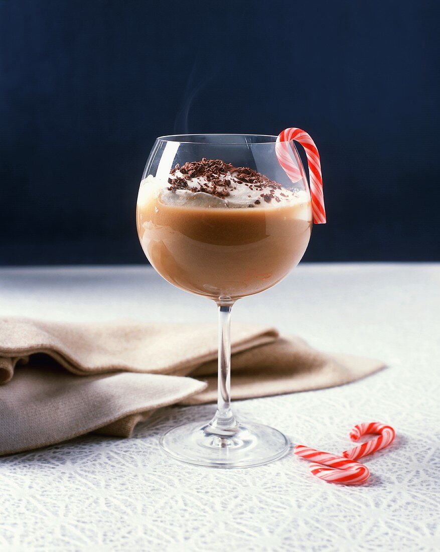 Hot Chocolate and Baileys Irish Cream Served in a Stem Glass with a Candy Cane