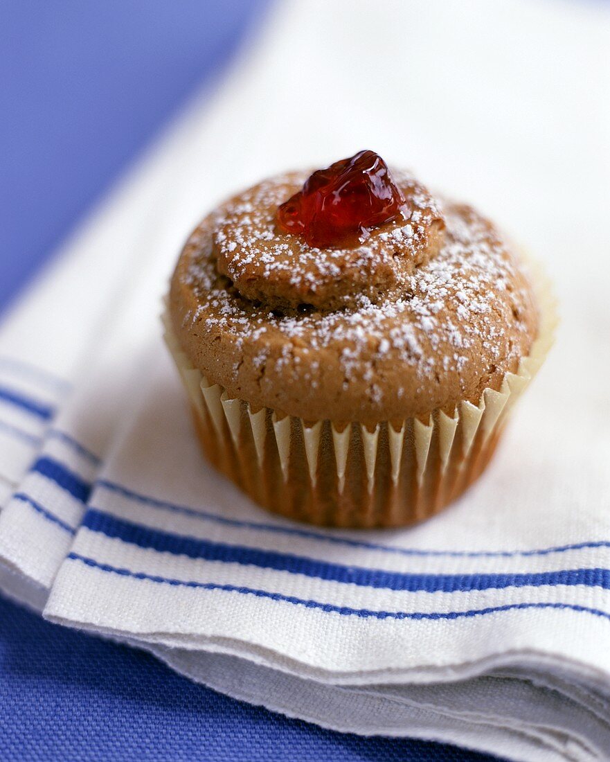 A chocolate nut muffin filled with jam