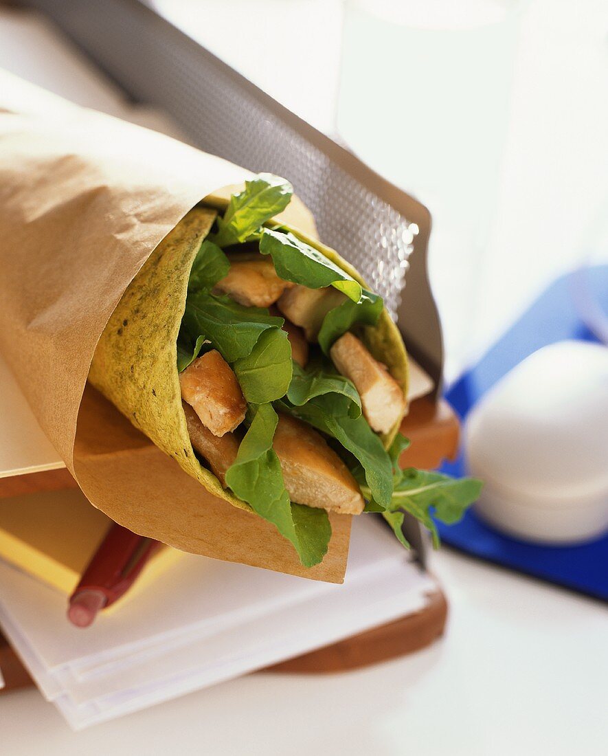 Wrap with chicken breast and salad leaves