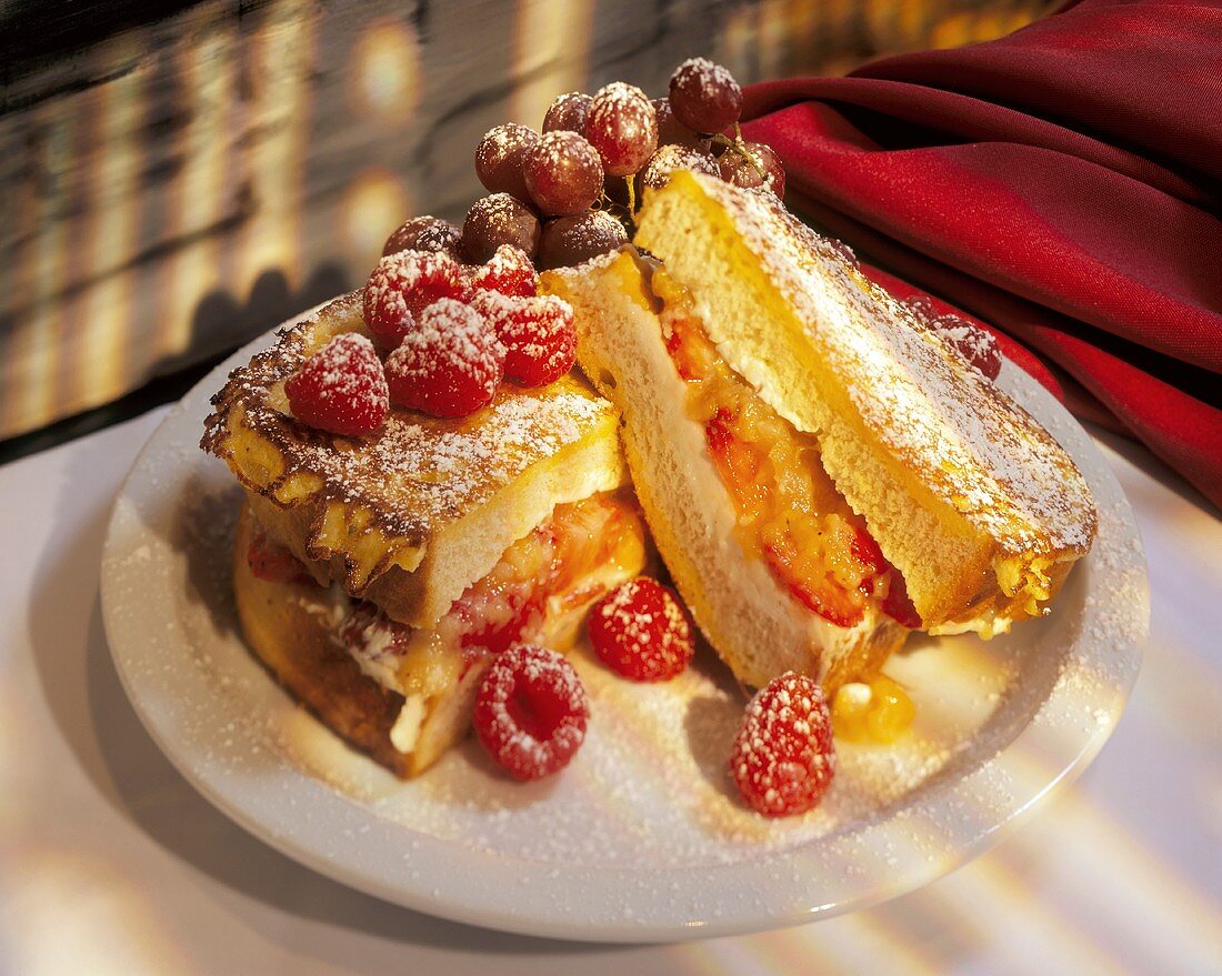 French toast with icing sugar and fruit filling
