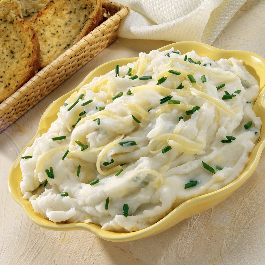 Mashed potatoes with grated cheese and chives
