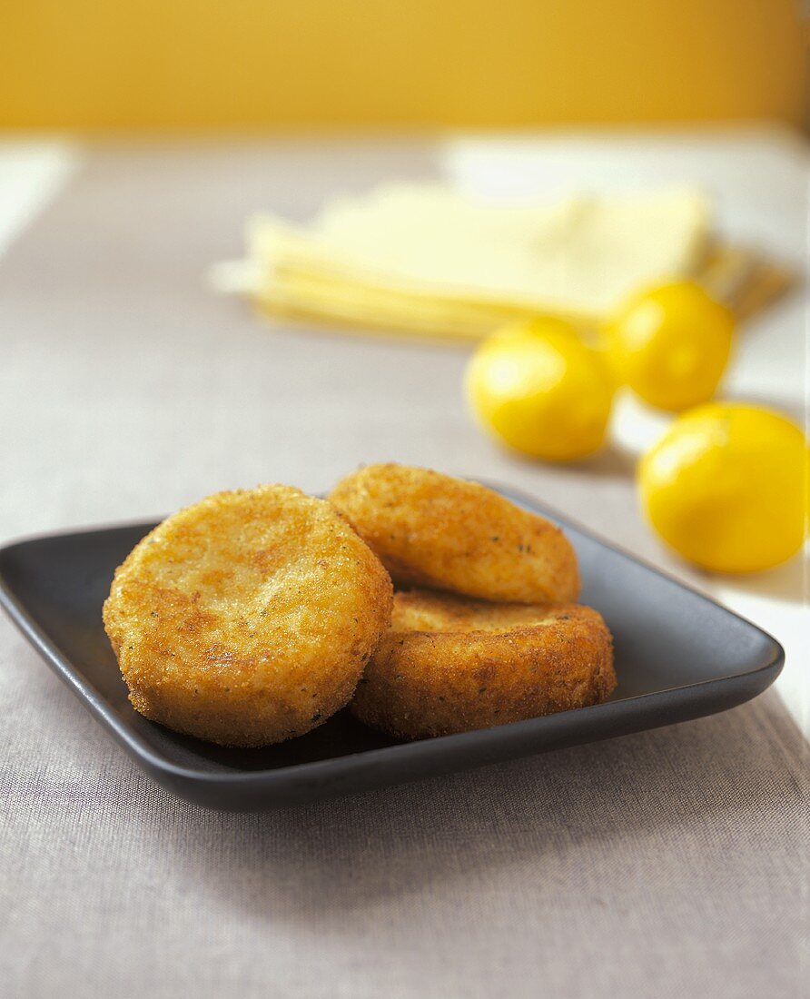 Three Risotto Cakes with Lemons