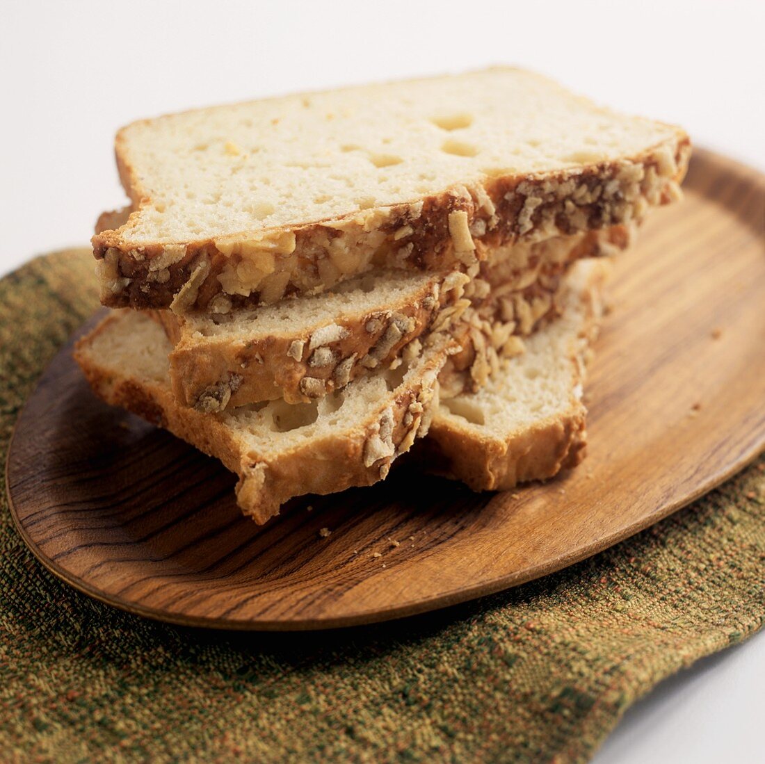 Three Slices of Bread on a Wooden Board