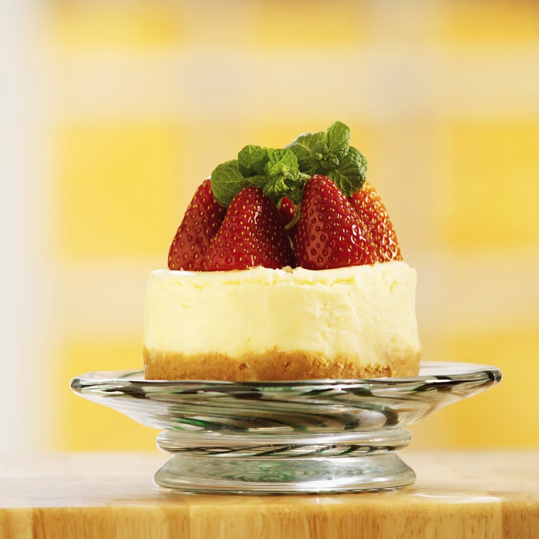A Mini Cheesecake with Strawberries and Mint