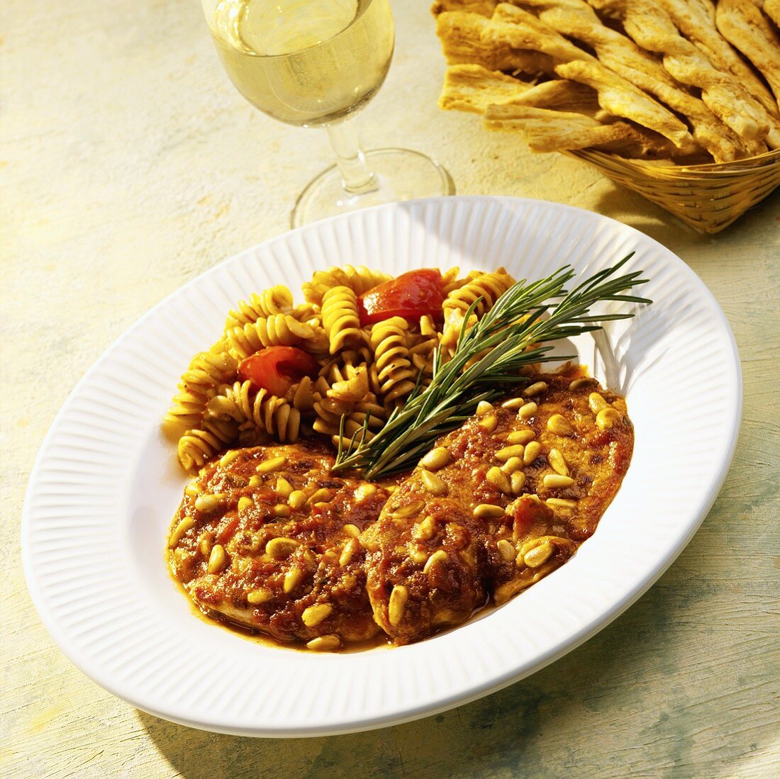 Tilapia in a Tomato Sauce with Pine Nuts and Pasta