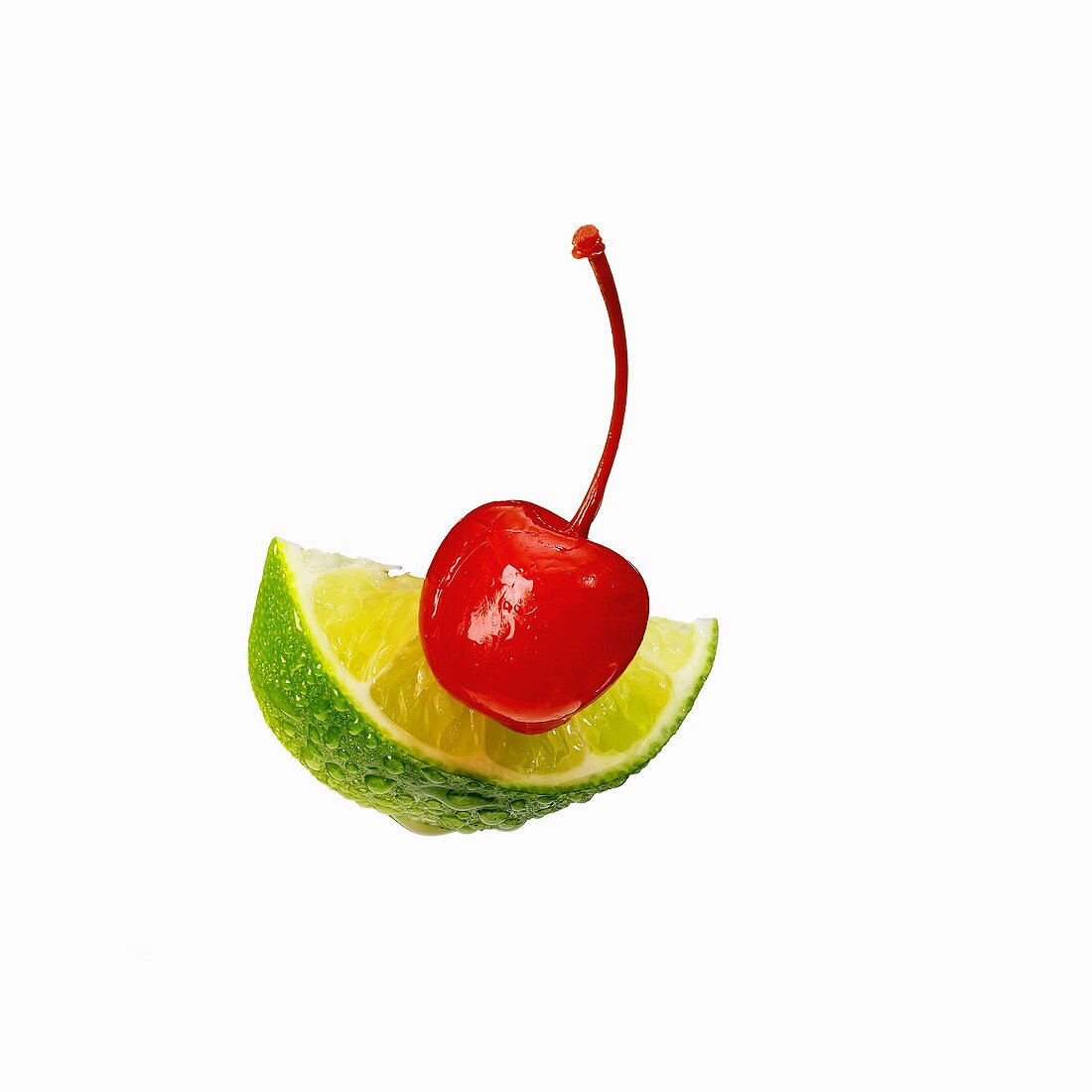 A Maraschino Cherry with a Lime Wedge