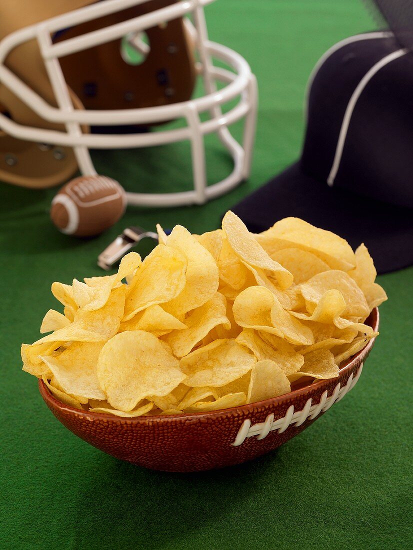 Chips in a Football Bowl with Helmet