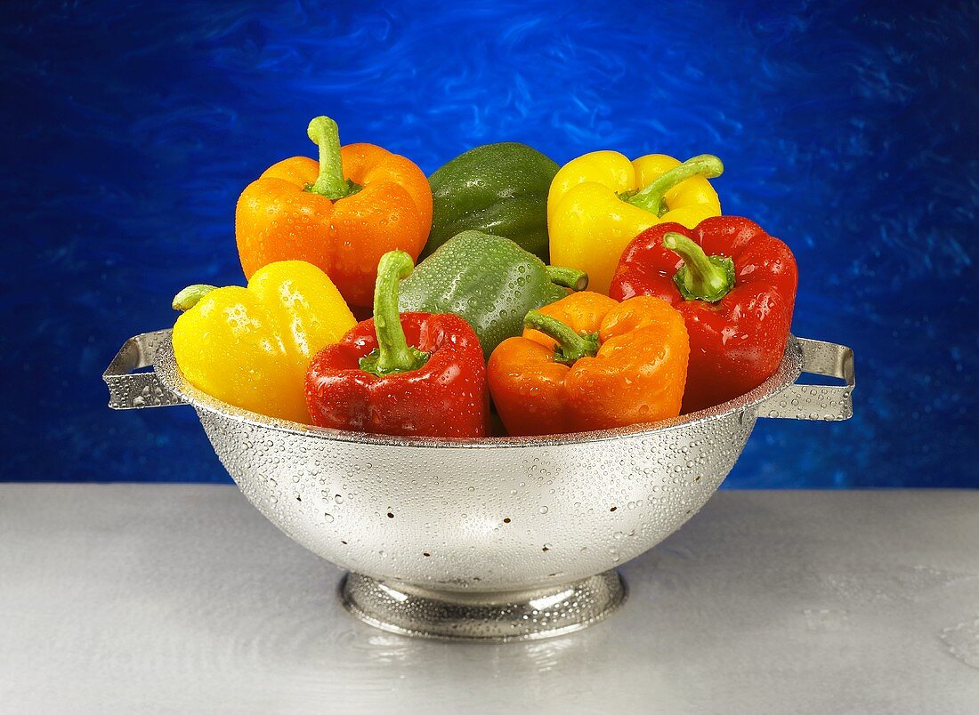 Freshly Washed Bell Peppers in a Colander