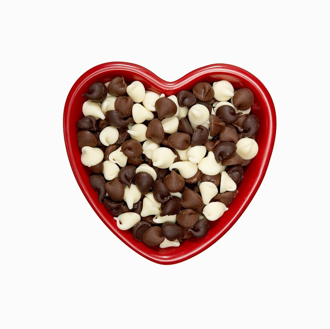Milk, White and Dark Chocolate Chips in a Heart Shaped Bowl