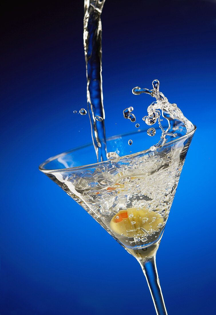 A Martini Pouring into a Glass