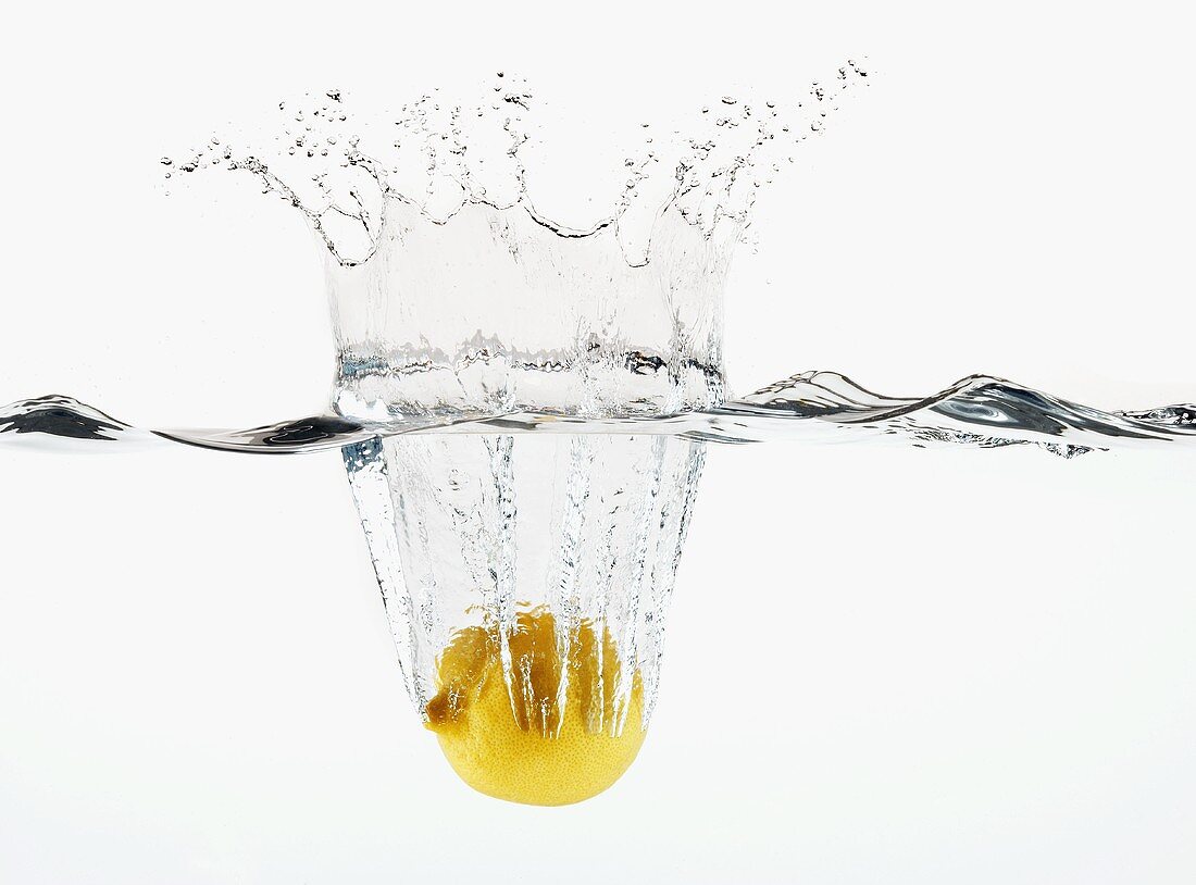 A Lemon Splashing into Water