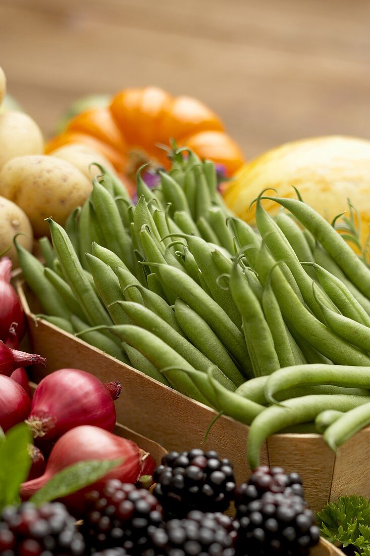 Green Beans, Blackberries and Red Onion at a Market Stand