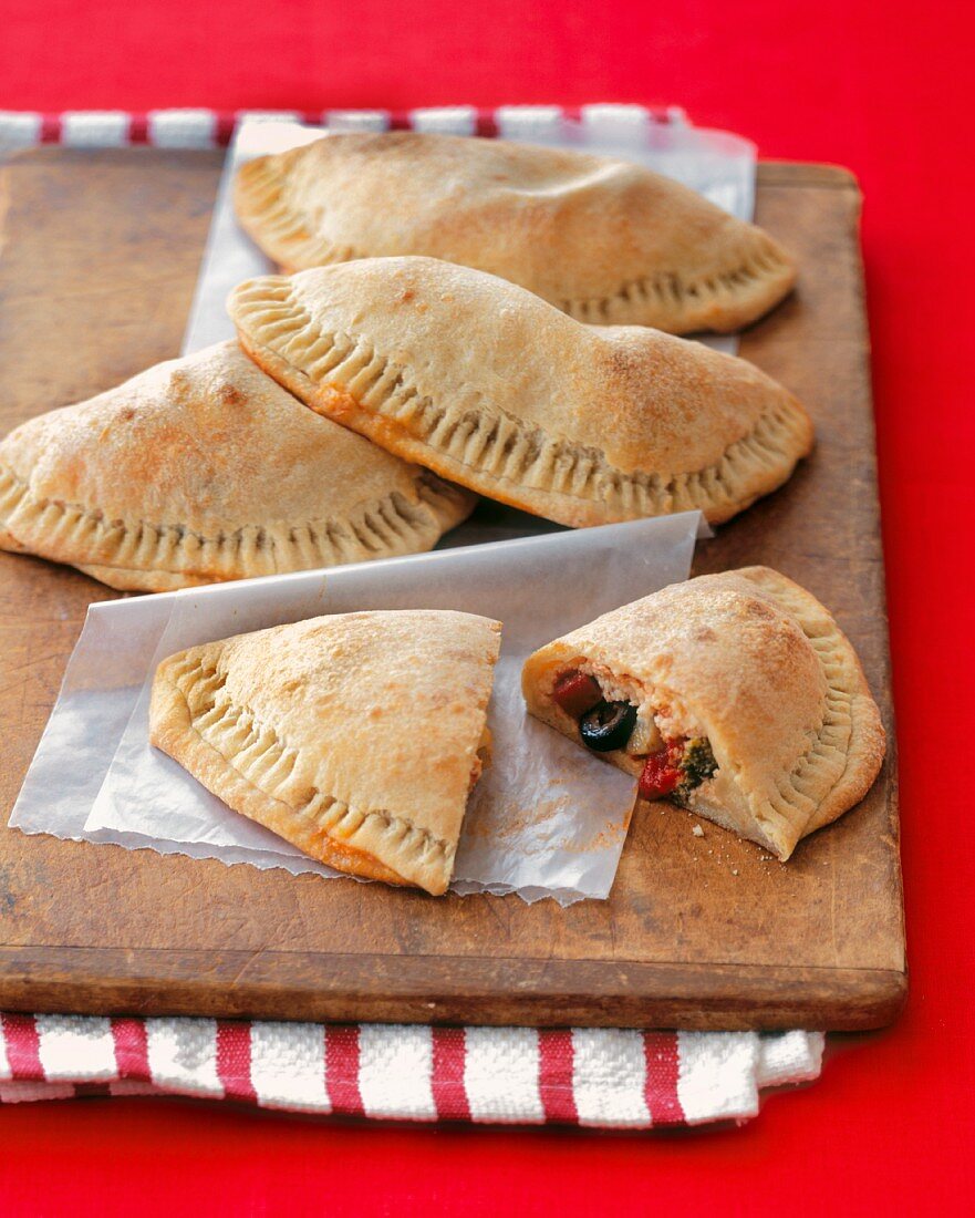 Vegetable Calzones on a Wooden Board