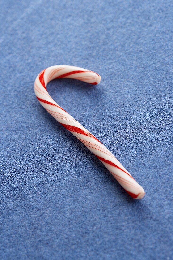 A Candy Cane on a Blue Background