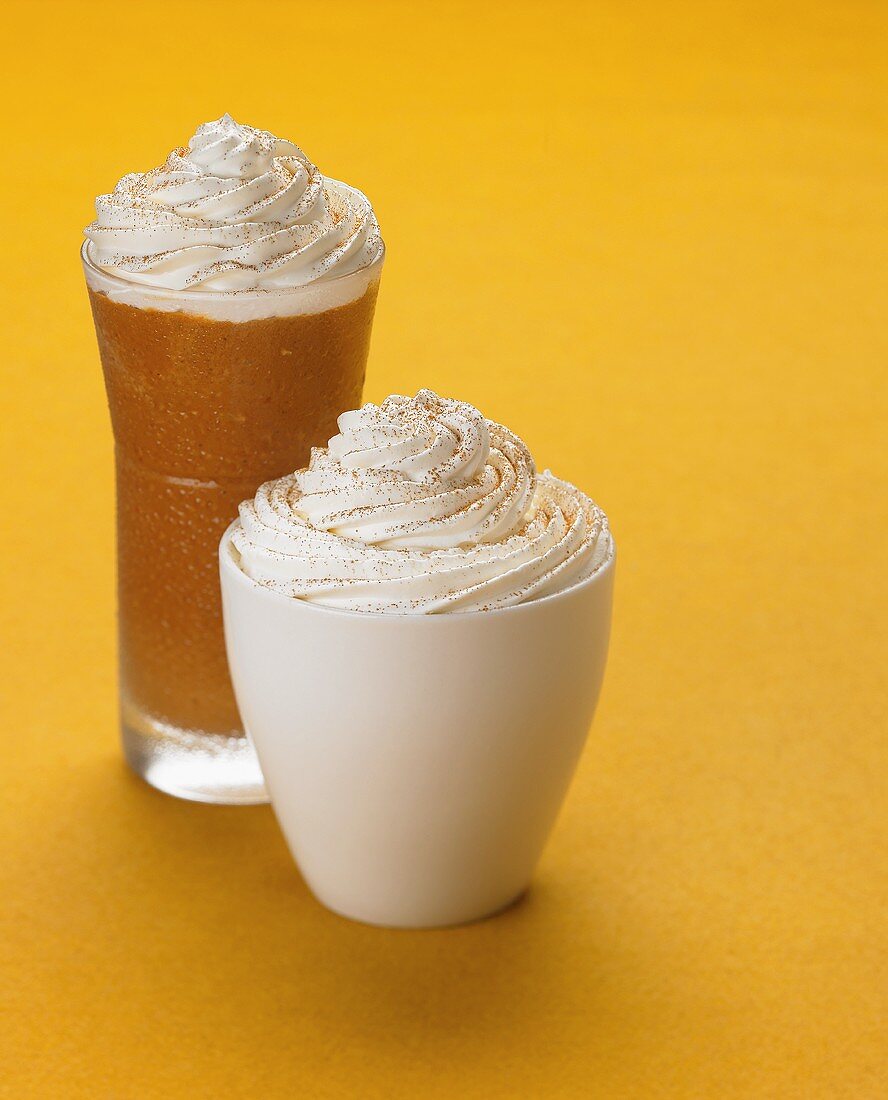 A Pumpkin Shake and a Cup of Ice Cream with Whipped Cream and Cinnamon