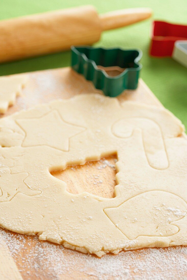 Cookie Dough Rolled Out with a Christmas Tree Cut Out