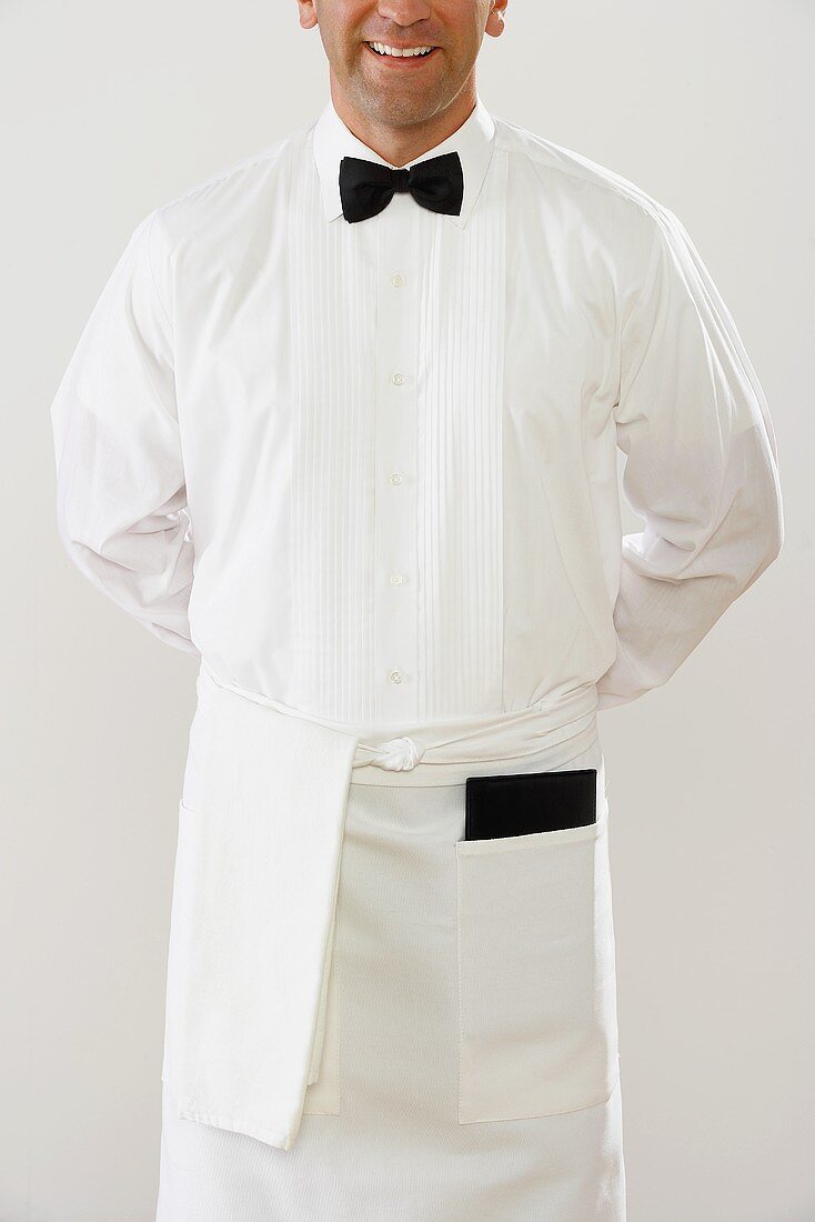 Waiter in white uniform