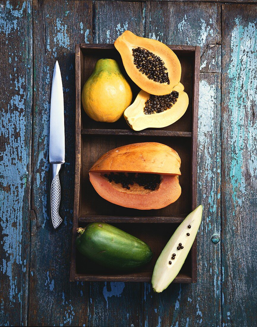 Papayas, Whole, Halved and Sliced