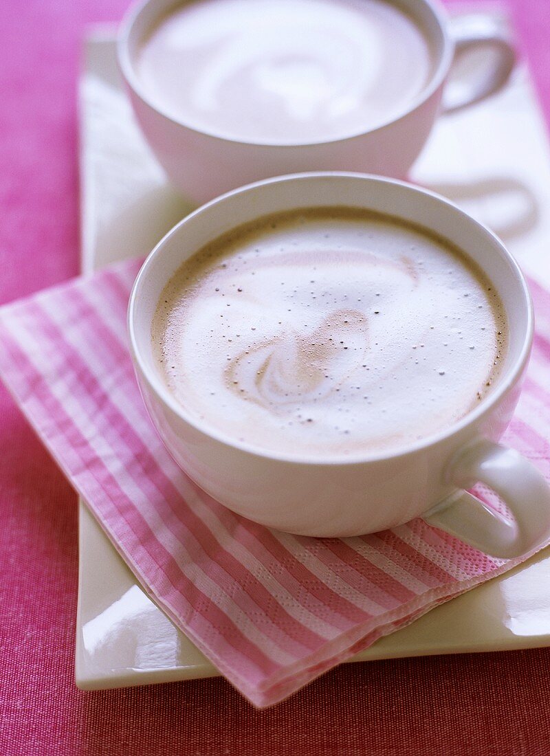 Two Cups of Hot Chocolate; Pink Striped Napkin