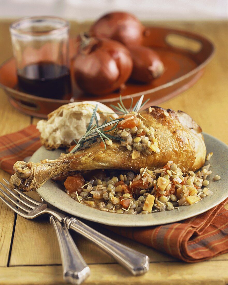 A Roasted Turkey Leg with Lentils and Bread