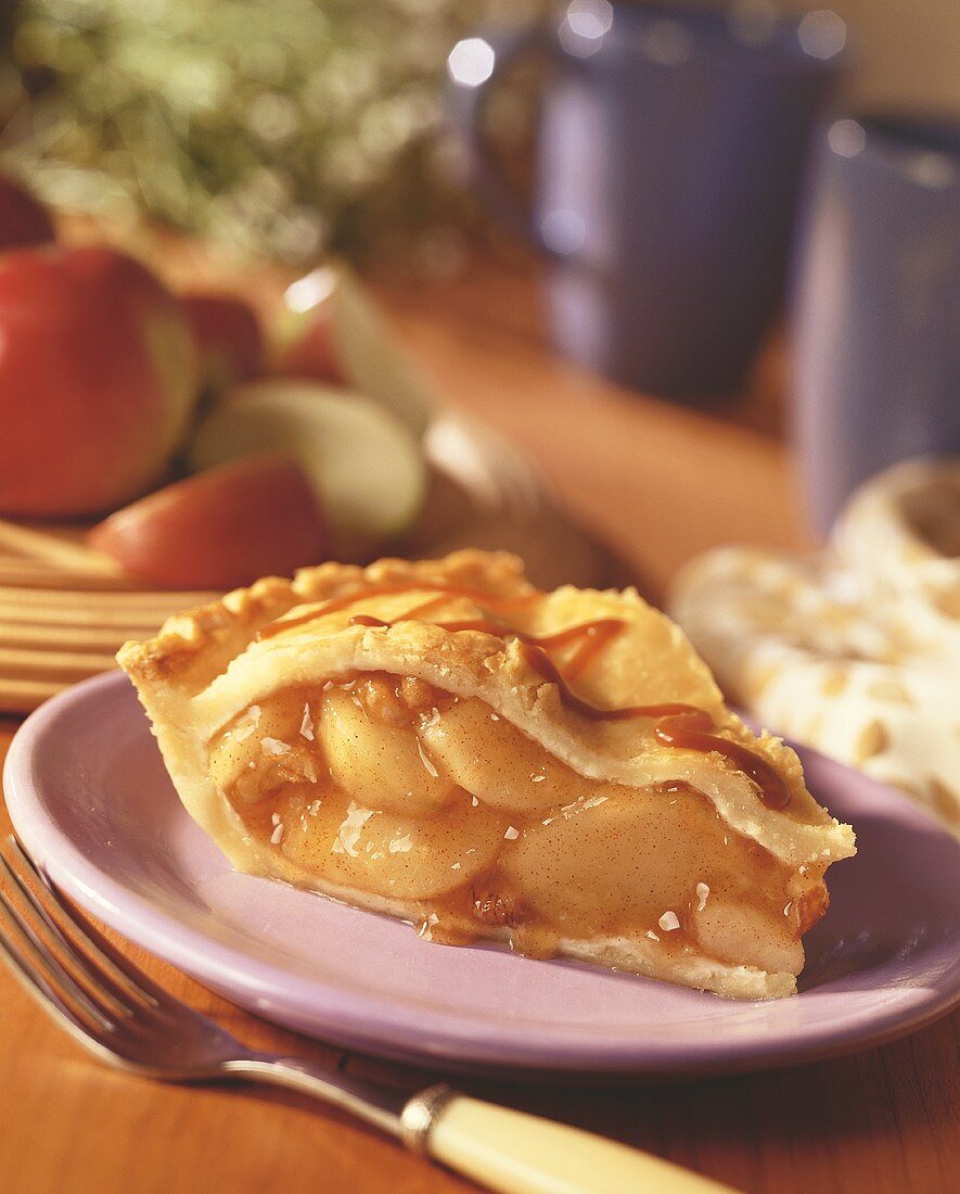 A slice of caramel walnut apple pie
