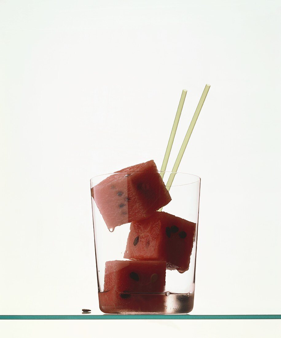 Cubes of watermelon in a glass