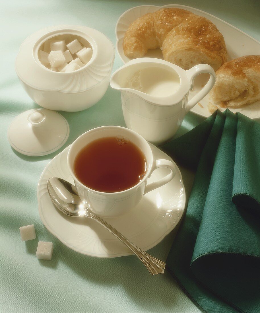 A Cup of Tea with Cream, Sugar and a Croissant
