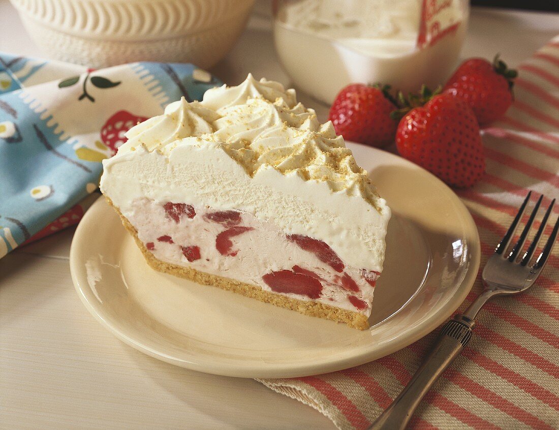 A slice of strawberry cream pie