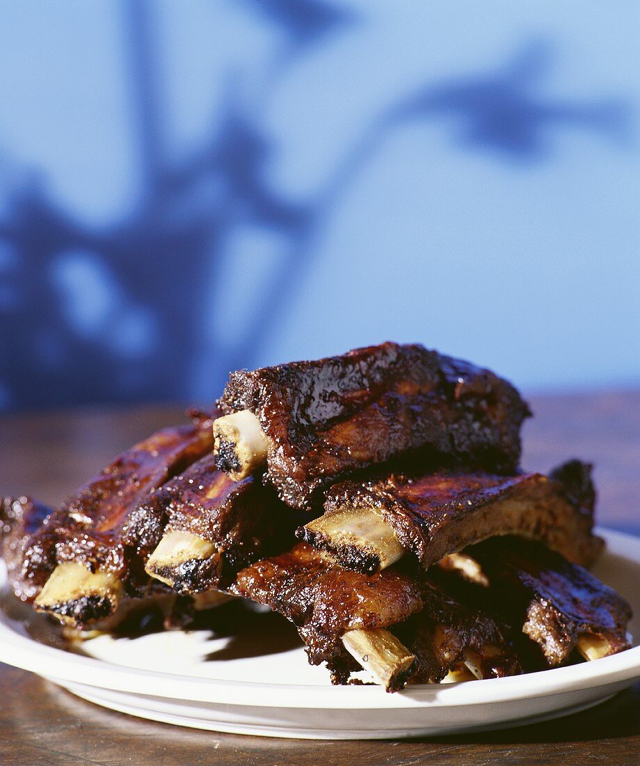 Barbecue ribs on a white plate