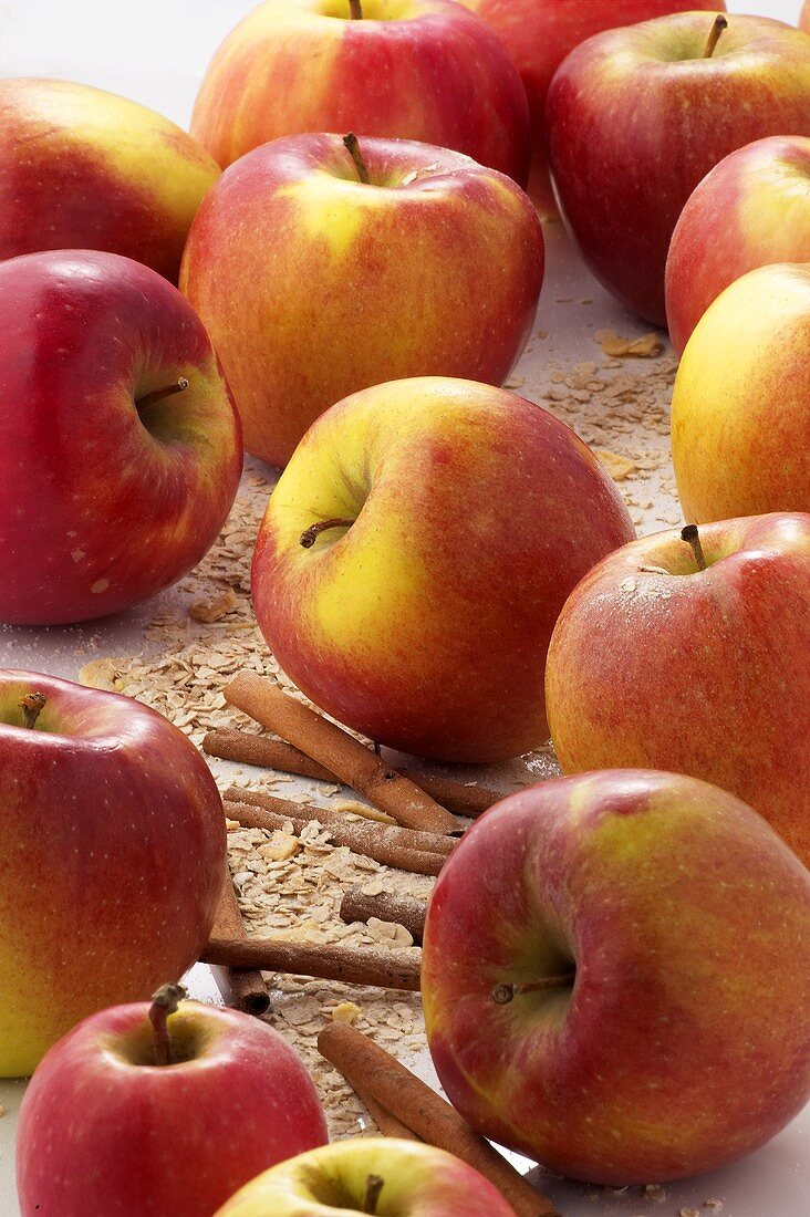 Still Life of Whole Apples, Cinnamon Sticks and Oats; Apple Crisp Ingredients