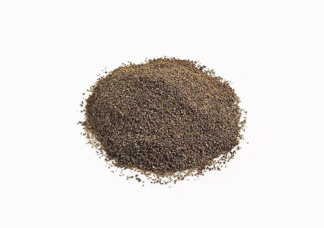 Pile of Celery Seeds on White Background