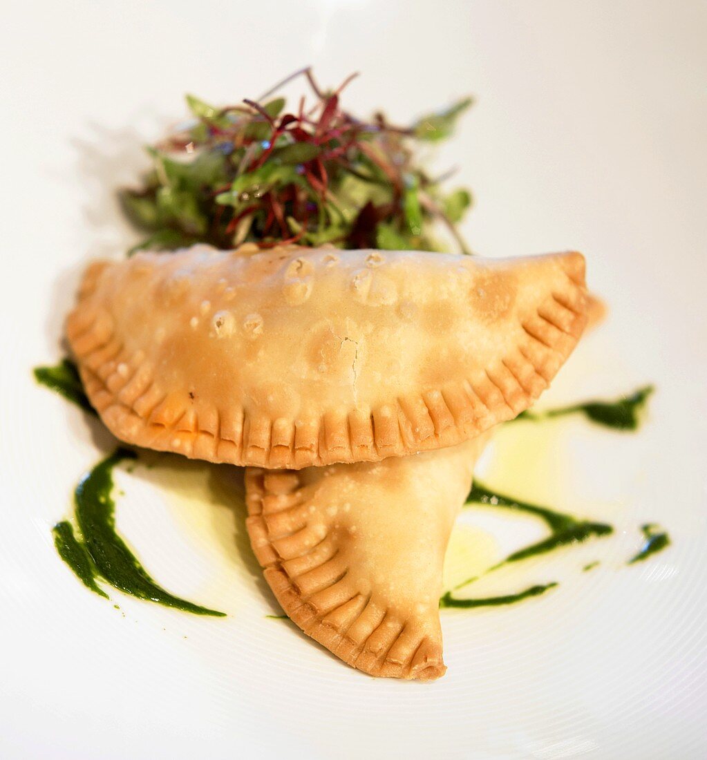 Two Empanadas with Mesclun Greens