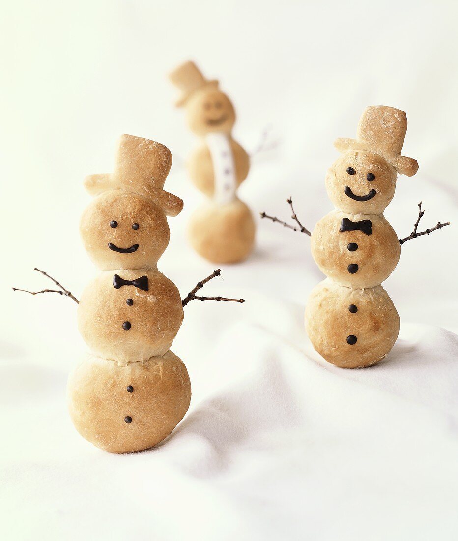 Baked snowmen (bread dough)