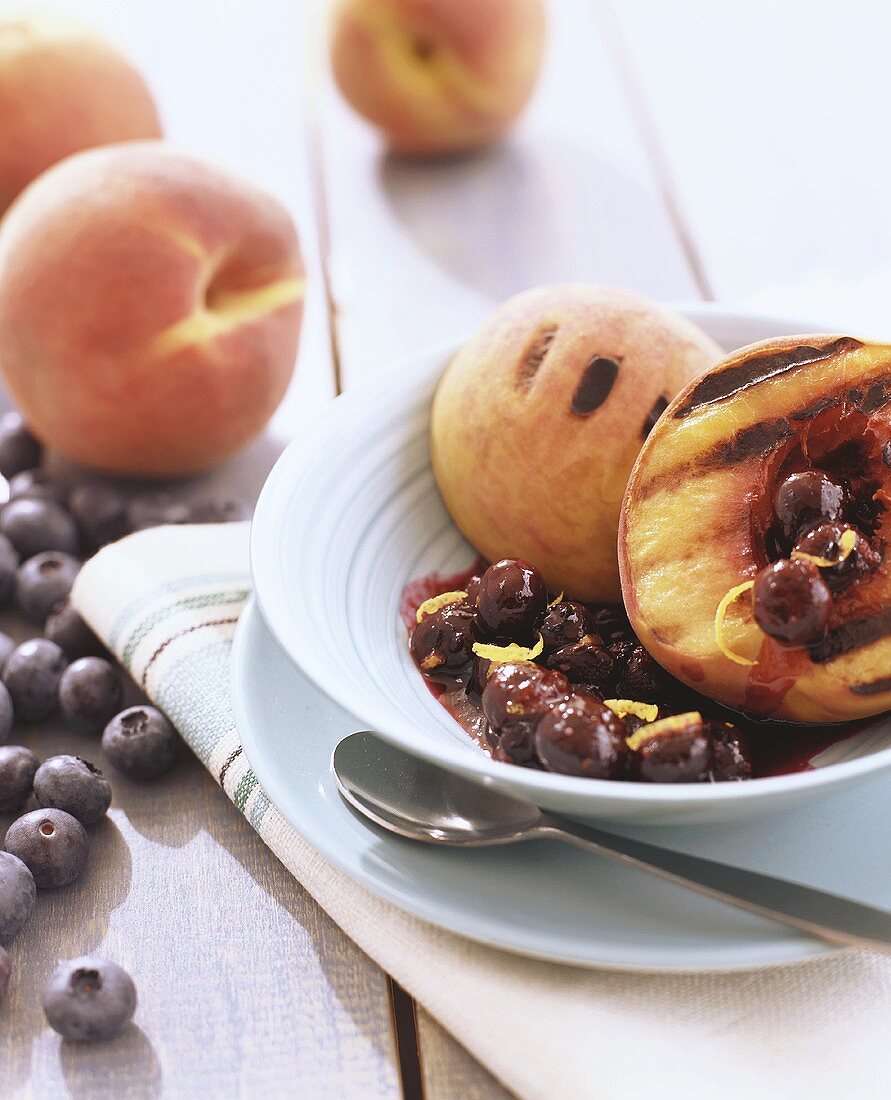 Grilled peach with blueberry compote