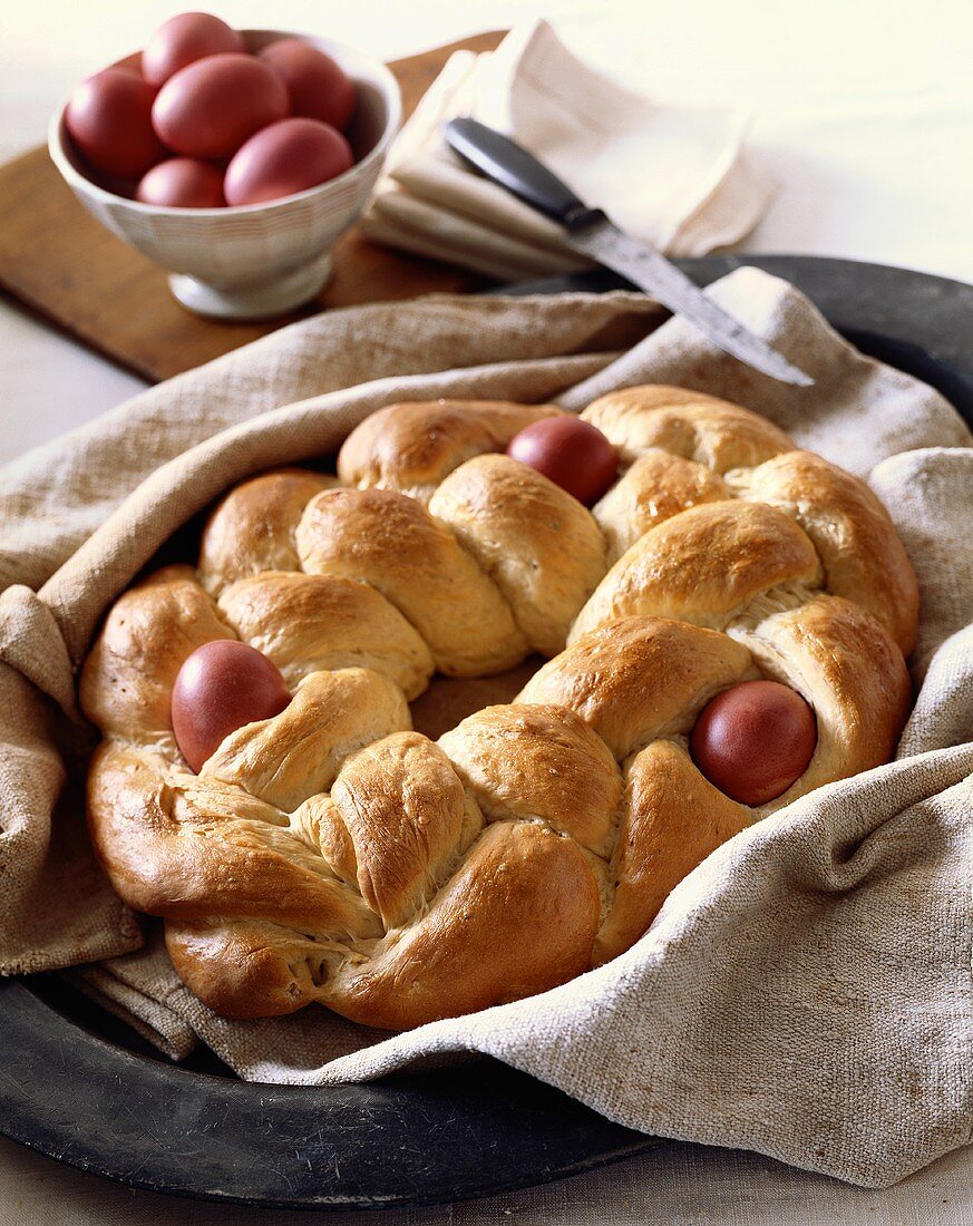 Loaf of Greek Easter Egg Bread; Bowl of Red Eggs
