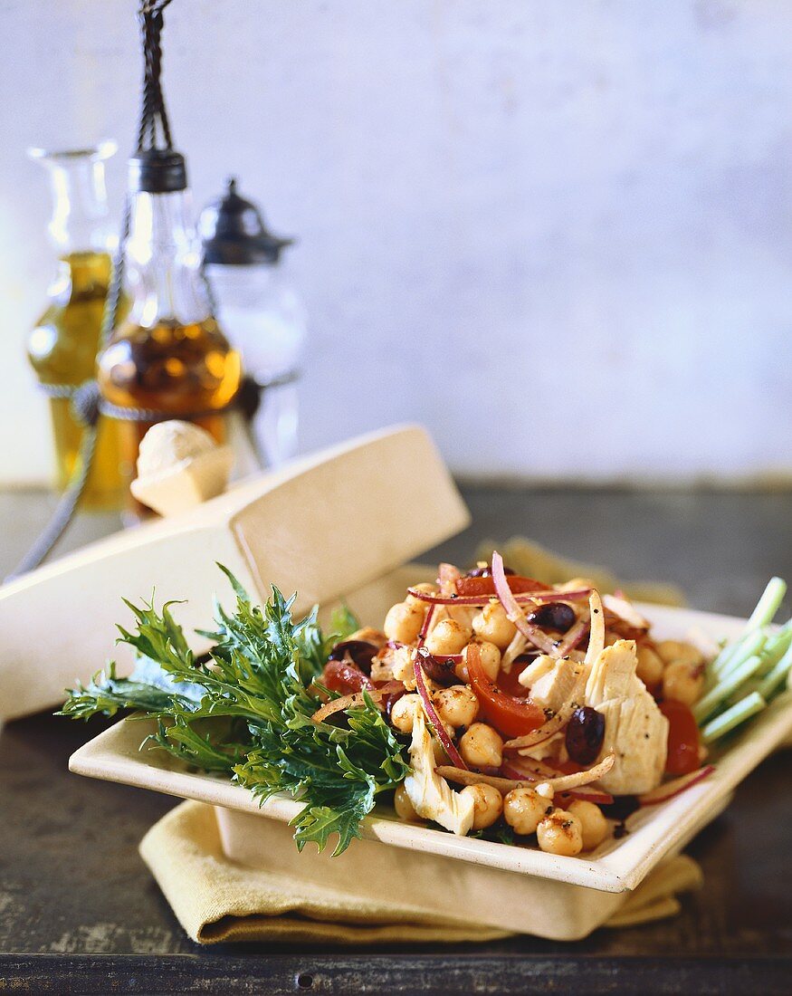 Tuna, Chickpea, Tomato and Red Onion Salad on Greens