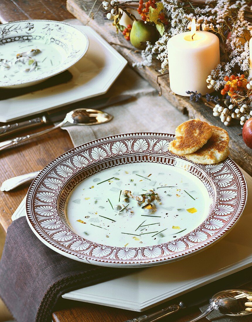 Bowl of Oyster Chowder on Holiday Table