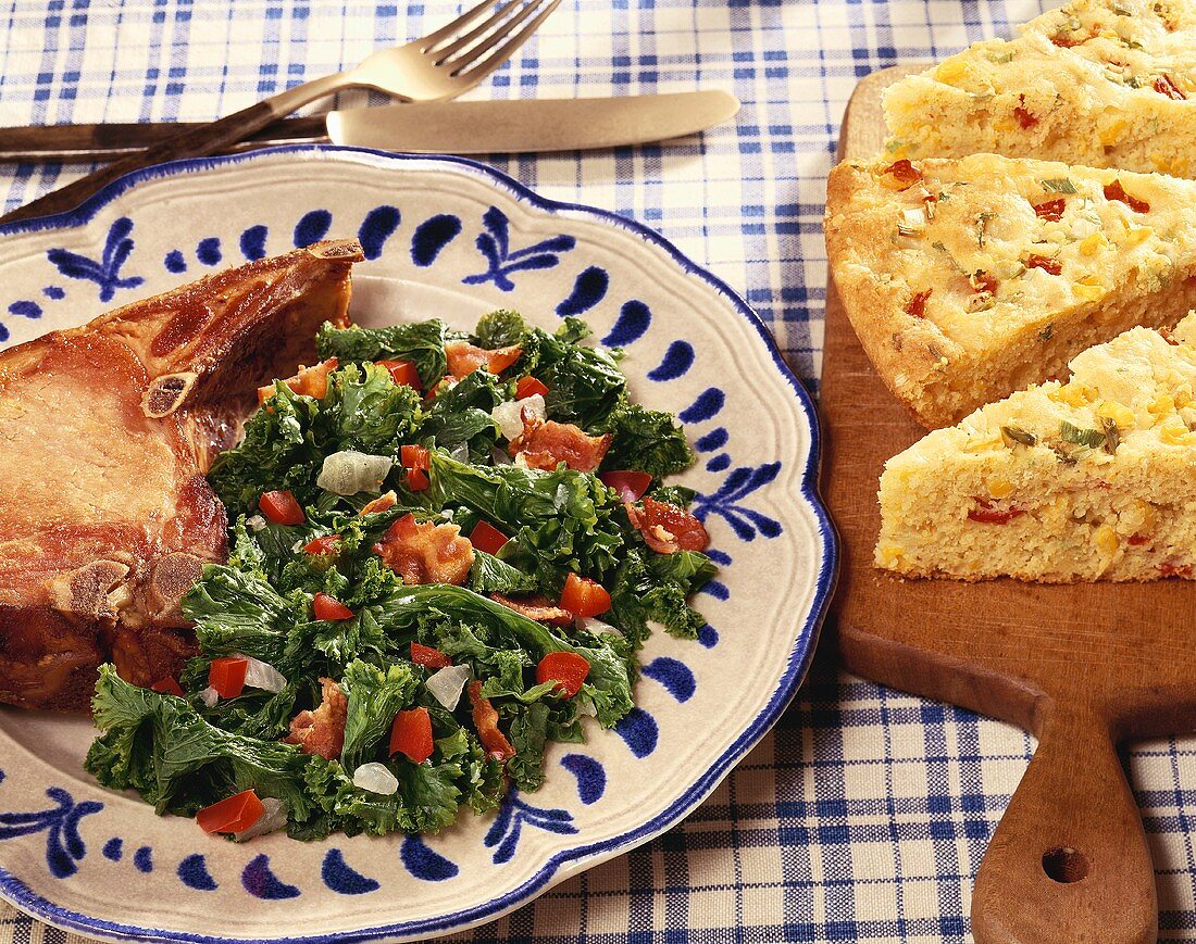 Pork Chop with Fried Greens with Red Bell Pepper and Bacon; Corn Bread