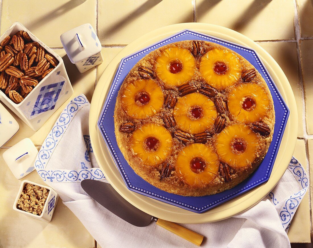 Pineapple Upside Down Cake with Pecans; Pie Server and Canister of Pecans