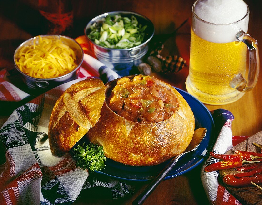 Chili in Bread Bowl with Mug of Beer