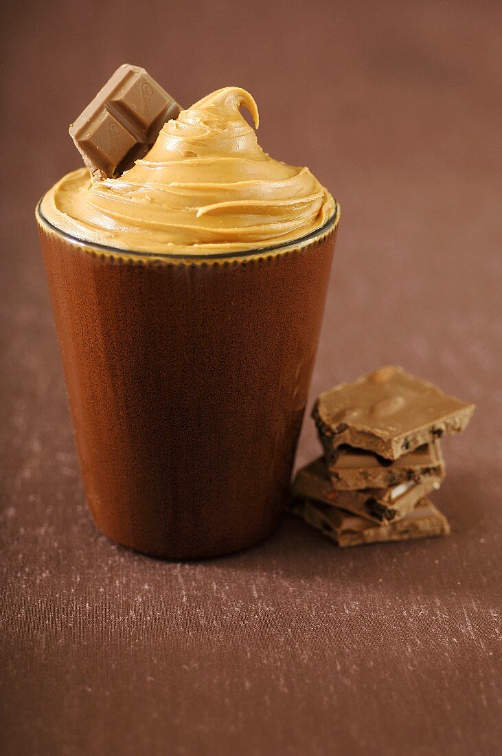 Brown Cup Filled with Peanut Butter with Milk Chocolate Chunks