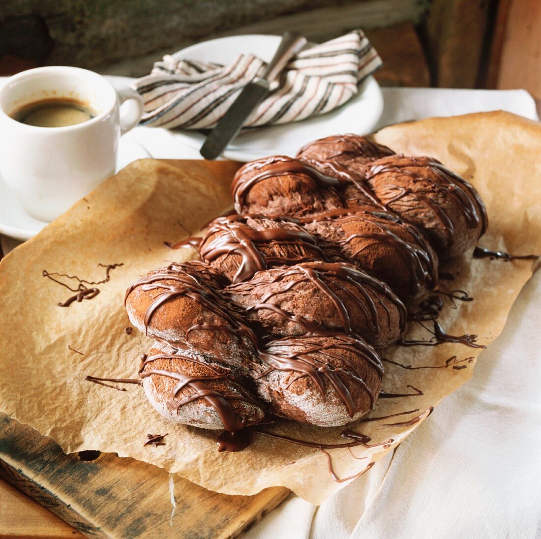 Chocolate yeast plait and cup of coffee
