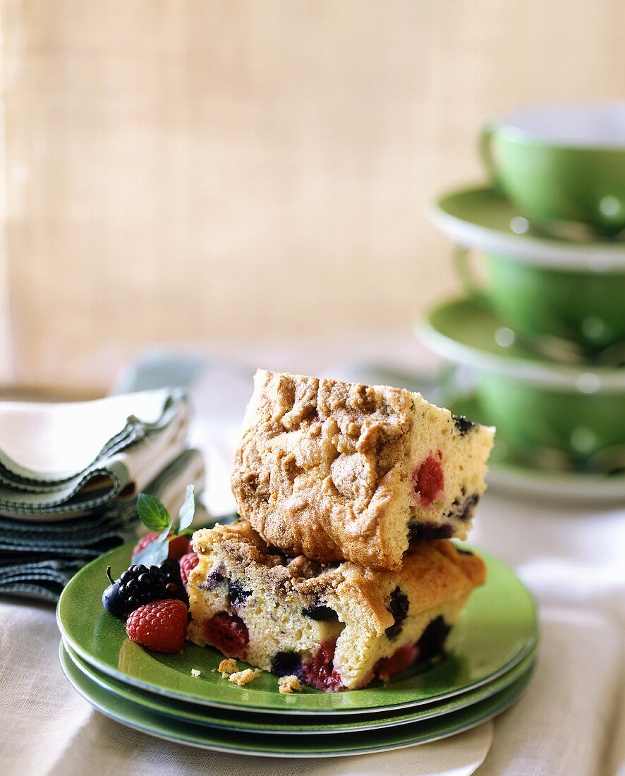 Two pieces of berry coffee cake